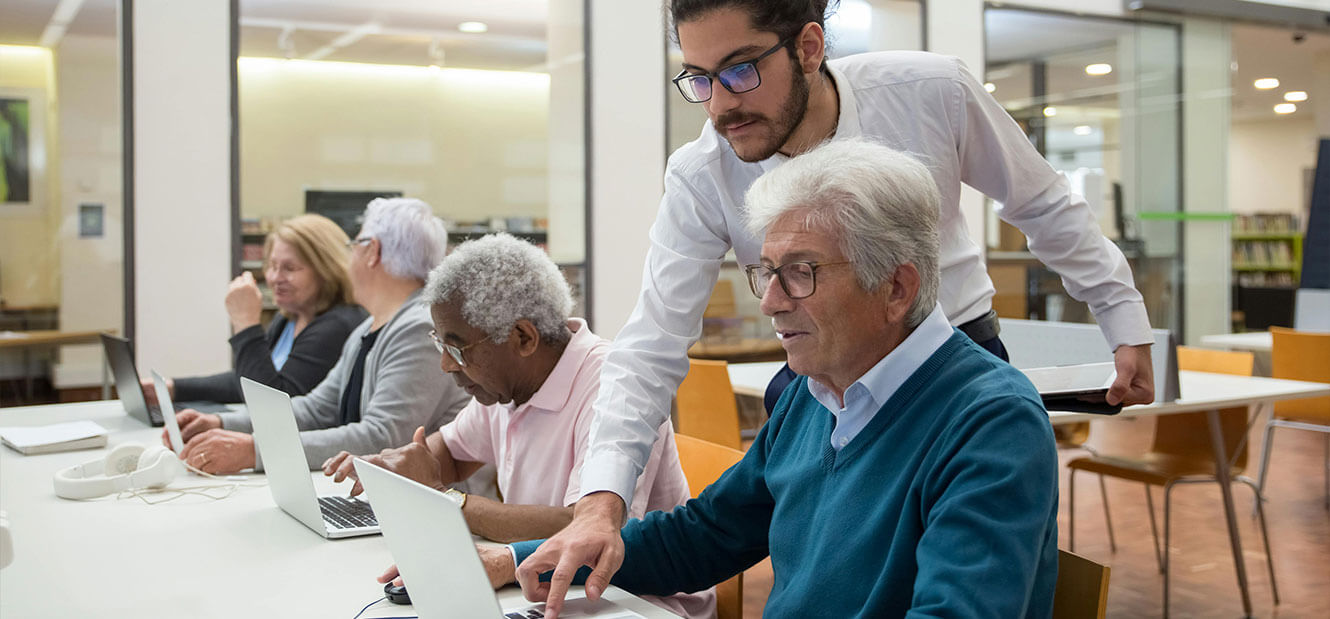 An image of a computer class for seniors.